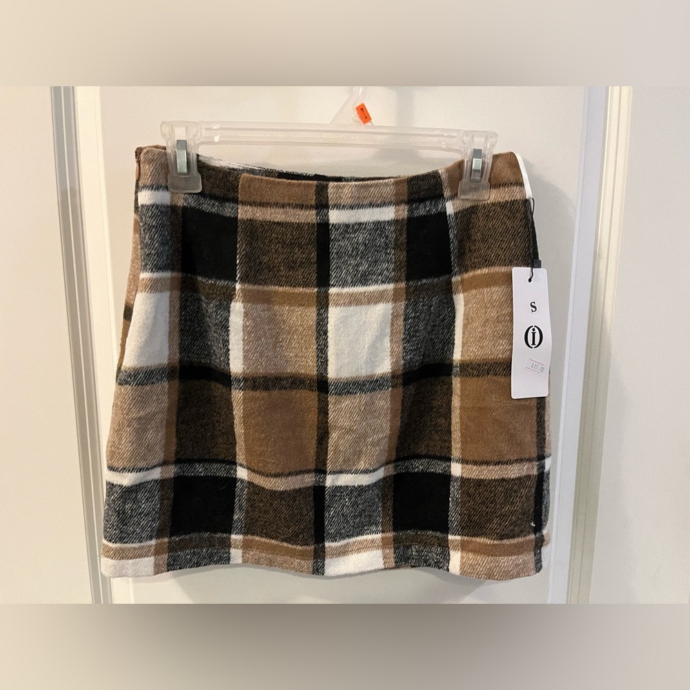 Black, tan and white plaid skirt